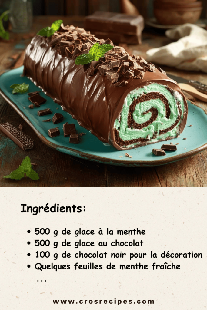 Bûche menthe chocolat glacée décorée de feuilles de menthe et de copeaux de chocolat noir.