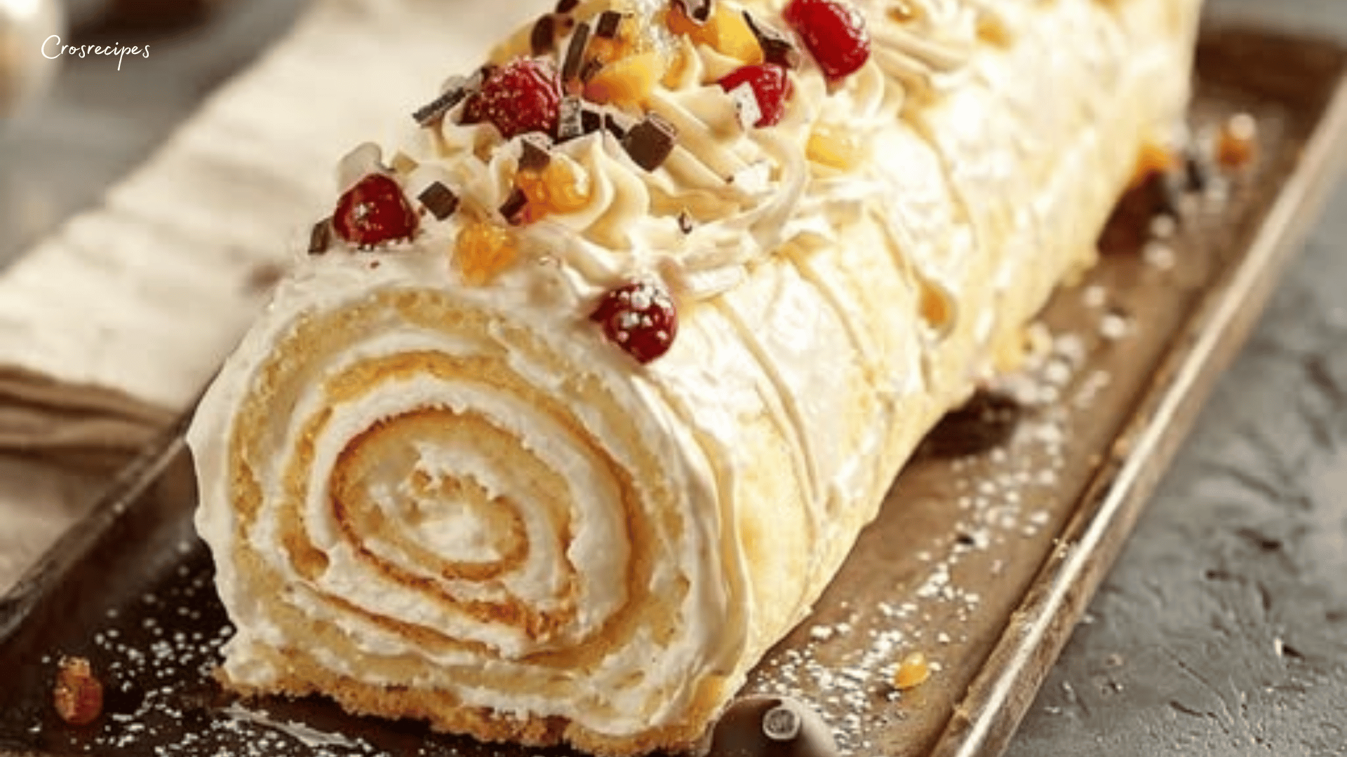 Bûche au mascarpone et fruits rouges décorée de fruits frais