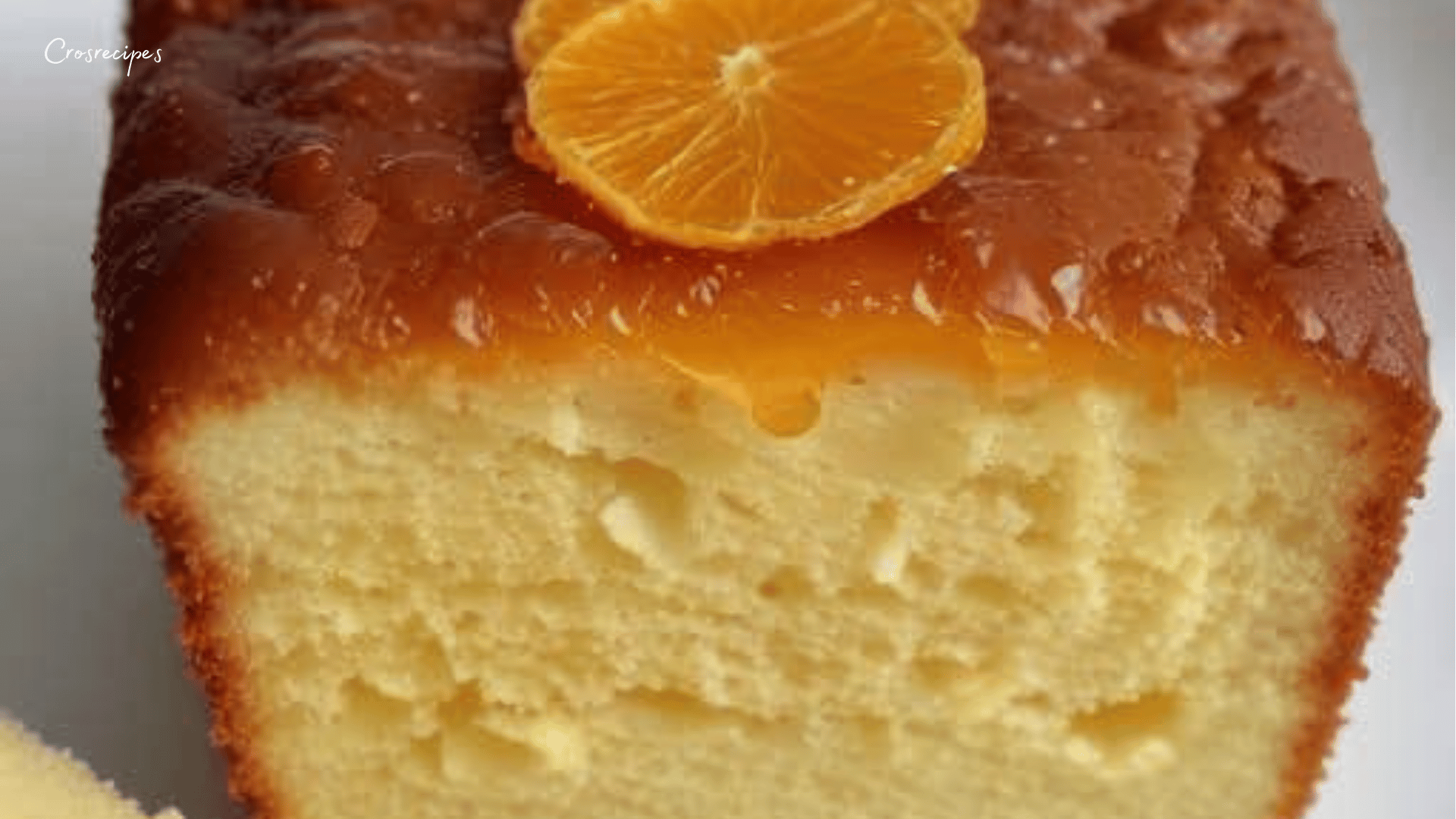 Cake à l’orange maison, moelleux et imbibé de sirop à l’orange.