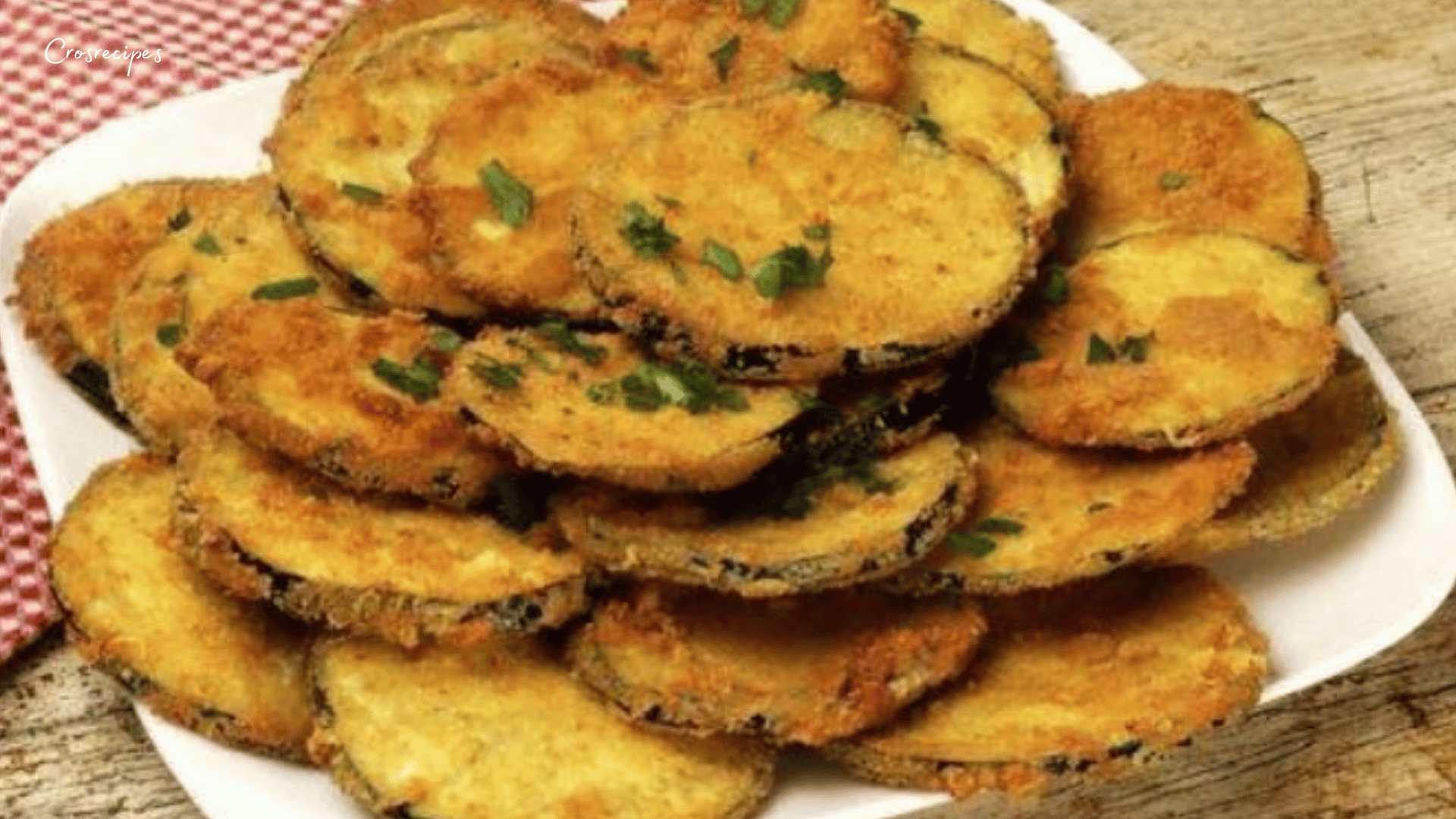 Tranches d’aubergines panées croustillantes, dorées à la perfection.