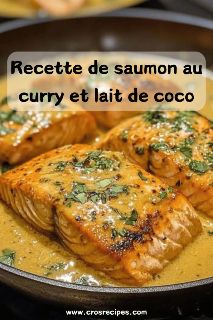 Saumon au curry et lait de coco, nappé d’une sauce crémeuse épicée, garni de coriandre fraîche, servi dans une assiette avec une touche de citron.