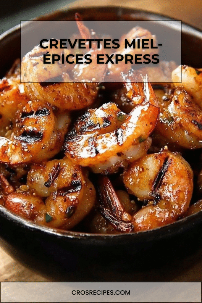 Crevettes sautées caramélisées au miel et épices, servies dans une assiette avec herbes fraîches.