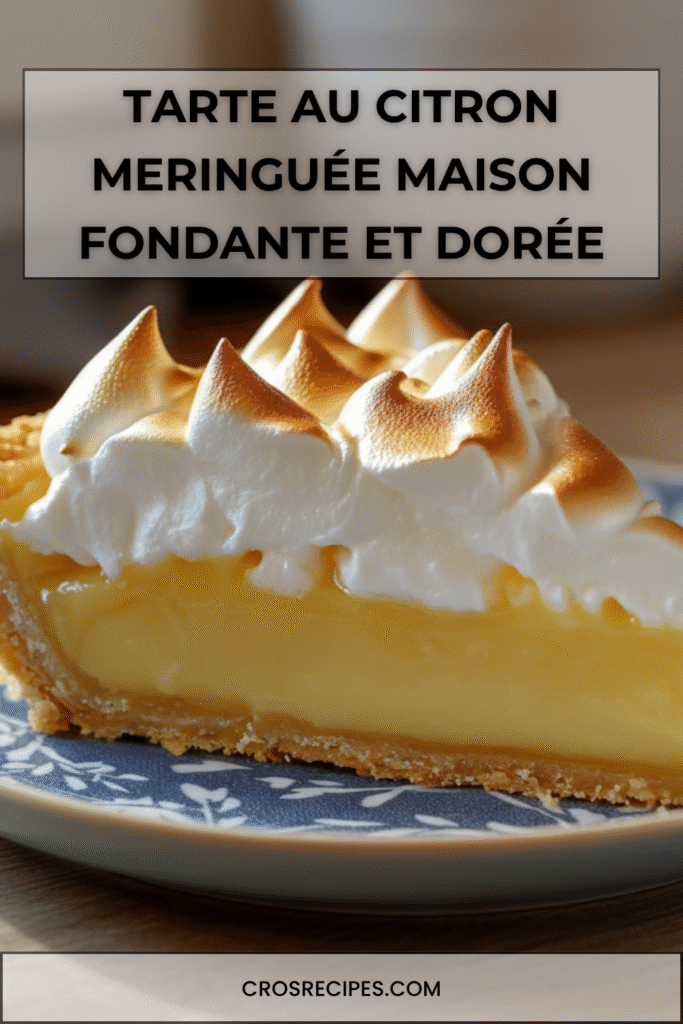 Tarte au citron meringuée avec crème citronnée brillante et meringue italienne dorée.