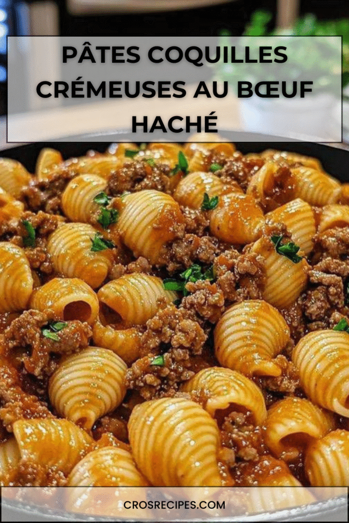 Pâtes coquilles crémeuses au bœuf haché, sauce tomate onctueuse et fromage fondu, servies chaudes dans une assiette.