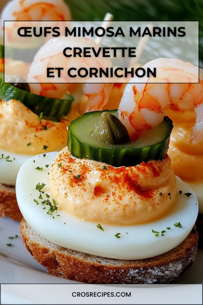 Œufs mimosa marins garnis de crevettes et cornichons, dressés sur des toasts croustillants pour l’apéritif.