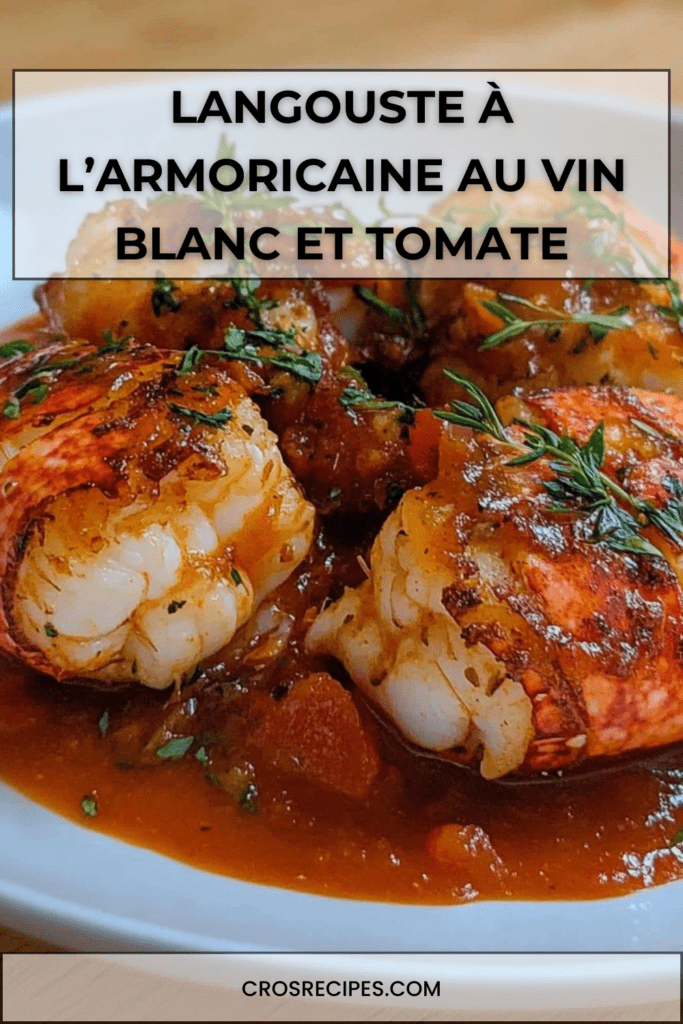 Assiette de langouste à l’armoricaine nappée de sauce tomate au vin blanc et herbes fraîches, servie avec du riz