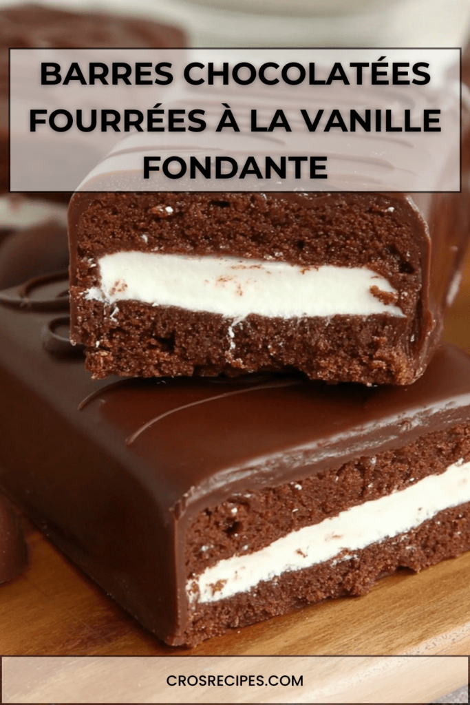 Barres chocolatées maison coupées en rectangles, enrobées de chocolat noir brillant et garnies d’un fourrage crémeux à la vanille de couleur blanche