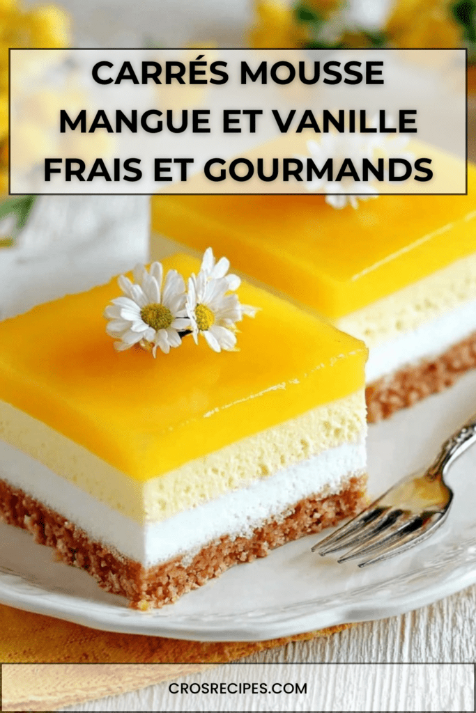 Carrés mousse mangue et vanille avec base biscuitée, couche vanille onctueuse, mousse mangue aérienne et nappage brillant, décorés de fleurs comestibles.