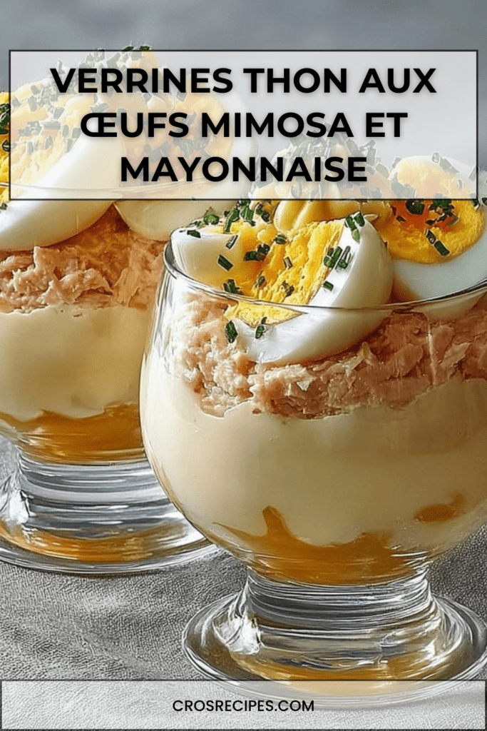 Verrines thon et œufs mimosa en couches, garnies de ciboulette fraîche et pointe de mayonnaise crémeuse.
