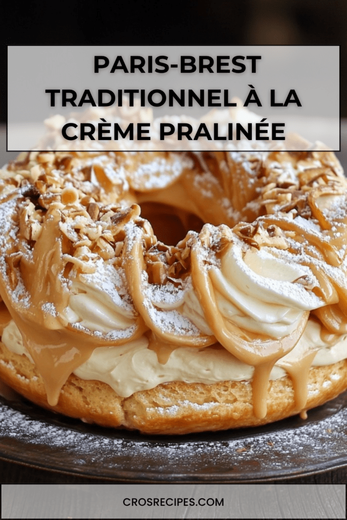 Paris-Brest traditionnel en couronne de pâte à choux dorée, garni d’une crème pralinée onctueuse et décoré d’amandes effilées et de sucre glace.