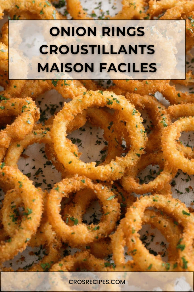 Onion rings croustillants maison servis chauds avec une panure dorée, du persil frais et une sauce crémeuse au ketchup et paprika.